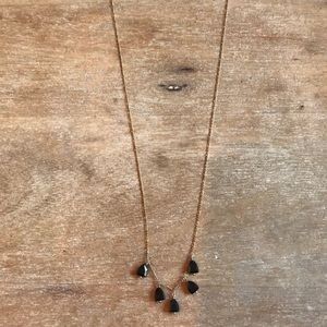Delicate Club Monaco necklace with black stones